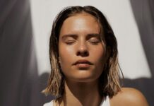 “여름철 피부 건강, 올바른 관리로 지키세요” woman in white tank top