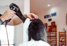 두피부터 모발까지, 건강한 헤어 라이프스타일 최신 트렌드와 실천법 woman in white shirt holding hair blower