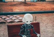 AI 기반 건강 관리, 내 손안의 주치의로 자리 잡다 black and white robot toy on red wooden table